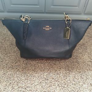 Coach tote in navy blue and gold.